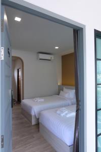Postel nebo postele na pokoji v ubytování Li CALLA Resort Trat
