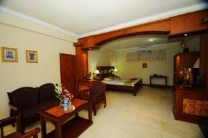 Postel nebo postele na pokoji v ubytování Melasti Beach Resort & Spa Legian