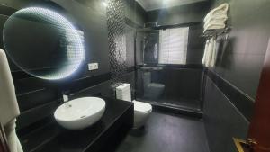 Koupelna v ubytování Indico Apart Hotel