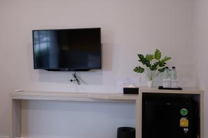 TV a/nebo společenská místnost v ubytování Li CALLA Resort Trat