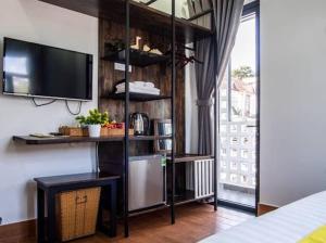 Kuchyň nebo kuchyňský kout v ubytování Richy Dalat Hotel