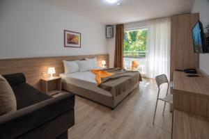 Posezení v ubytování Ariana Hotel