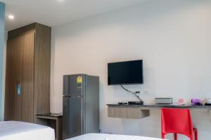 TV a/nebo společenská místnost v ubytování S2 Airport Residence