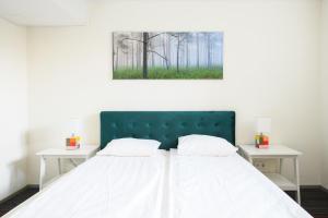 Postel nebo postele na pokoji v ubytování Stay to Stay Apartments - võtmeta sissepääs