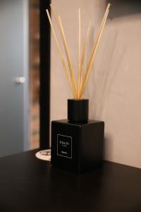 a black box with a potted plant on a table at Brik Hotel in Odesa