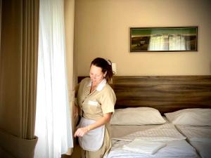 Łóżko lub łóżka w pokoju w obiekcie Hotel & Restaurant Pod Kaštany
