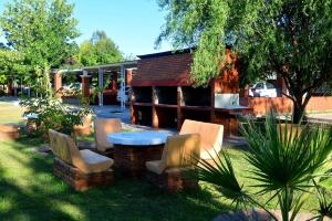 Un jardín fuera de Sesma Excelencia en Cabañas