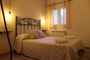 Krevet ili kreveti u jedinici u objektu Apartamentos Rurales Parajes de Piedra