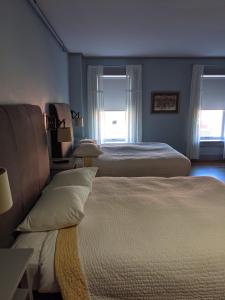 Postel nebo postele na pokoji v ubytování Hotel on North