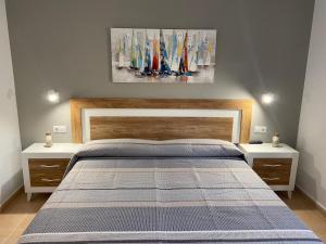 Säng eller sängar i ett rum på Oasis Fuerteventura Beach Apartments