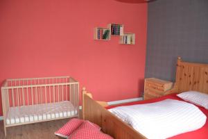 Letto o letti in una camera di La cense du vieux frêne