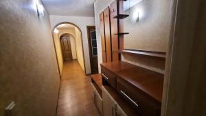 a hallway of a home with a room with a closet at Двухкомнатная квартира 900м от моря отчетные док in Chornomorsk