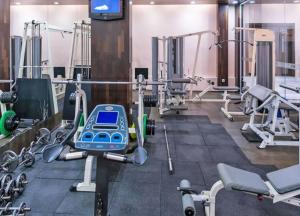 a gym with several treadmills and machines at Garden of Eden Complex Cesilia C 211 Sveti Vlas in Sveti Vlas