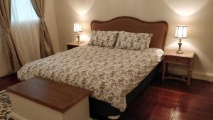 Tempat tidur dalam kamar di Divers Villa