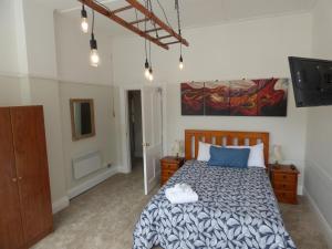 Katil atau katil-katil dalam bilik di Sahara Guest House