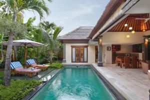 Swimmingpoolen hos eller tæt på The Buah Bali Villas