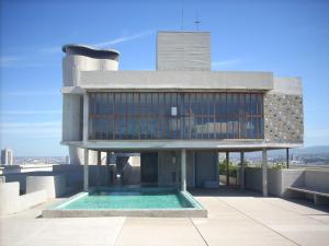 a building with a swimming pool on top of a building at Hotel le Corbusier in Marseille