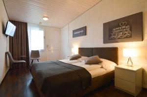 Ένα ή περισσότερα κρεβάτια σε δωμάτιο στο Hotel Bodensee-Arena