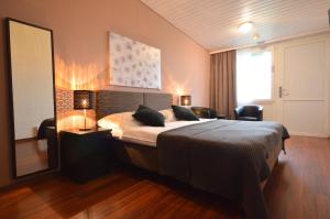 Ένα ή περισσότερα κρεβάτια σε δωμάτιο στο Hotel Bodensee-Arena