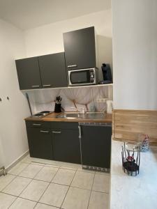 Kuchyňa alebo kuchynka v ubytovaní Bed & Rooms, Wörgl