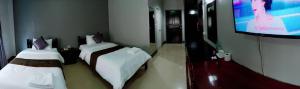 TV a/nebo společenská místnost v ubytování Submukda Phoomplace Hotel
