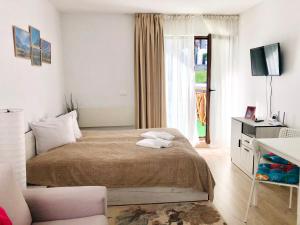 Postel nebo postele na pokoji v ubytování Temerso Studio-Apartment + 5 fotografií