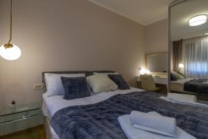 Tempat tidur dalam kamar di Apartment Casa di Lusso - Vila Peković Green
