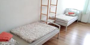 Postel nebo postele na pokoji v ubytování Teplice Central Park