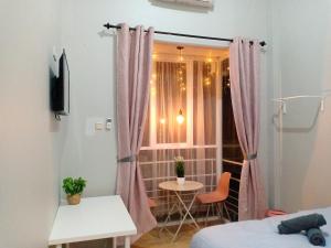 TV a/nebo společenská místnost v ubytování Ministry Homestay