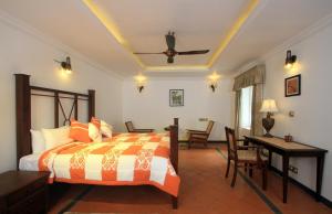 Katil atau katil-katil dalam bilik di Parisons Plantation Experiences by Abad