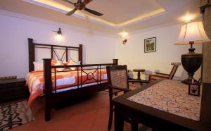 Katil atau katil-katil dalam bilik di Parisons Plantation Experiences by Abad