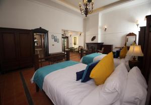 Katil atau katil-katil dalam bilik di Parisons Plantation Experiences by Abad