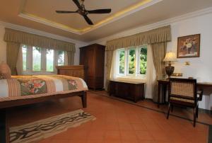 Katil atau katil-katil dalam bilik di Parisons Plantation Experiences by Abad