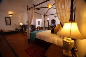 Katil atau katil-katil dalam bilik di Parisons Plantation Experiences by Abad