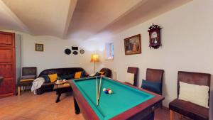 a living room with a pool table in it at Pension U Sebastiana in Hodousice