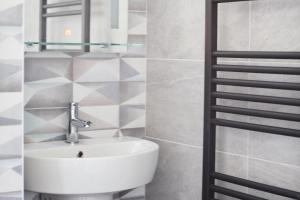Koupelna v ubytování Luxury Lodges in Doolin Village with Hot Tubs