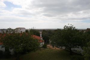 una vista desde el techo de una casa con árboles en Villa Pedras del Rey, en Luz de Tavira