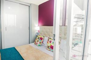 Giường trong phòng chung tại Hermoso y Acogedor Apartamento a Minutos del Parque del Café
