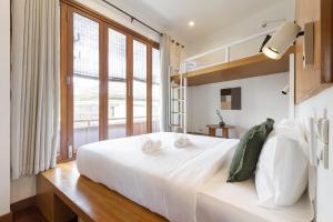 Ein Bett oder Betten in einem Zimmer der Unterkunft Hidden Garden Hostel