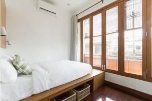 Ein Bett oder Betten in einem Zimmer der Unterkunft Hidden Garden Hostel