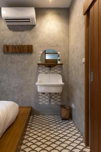 Ein Bett oder Betten in einem Zimmer der Unterkunft Hidden Garden Hostel