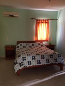 Ένα ή περισσότερα κρεβάτια σε δωμάτιο στο Villas Michaela Caribbean