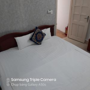 Voodi või voodid majutusasutuse Hanoi Carina Hotel toas