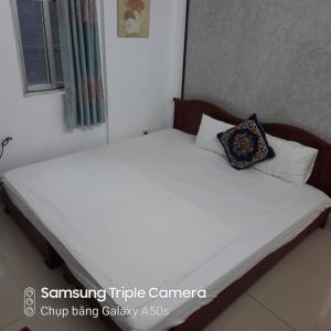 Voodi või voodid majutusasutuse Hanoi Carina Hotel toas