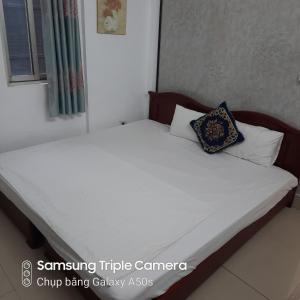 Voodi või voodid majutusasutuse Hanoi Carina Hotel toas