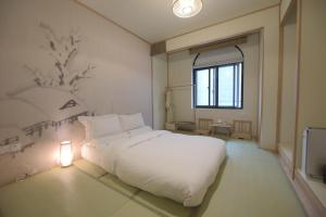 A bed or beds in a room at Livo