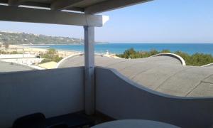 a balcony with a view of the beach and the ocean at Marina di VASTO in Vasto