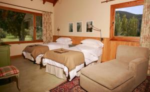 Кровать или кровати в номере Alhue - Casa en el Golf