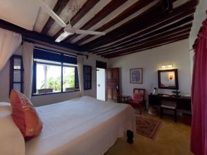 Postel nebo postele na pokoji v ubytování Peponi Hotel Lamu - Kenya