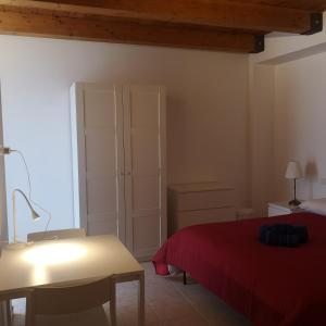 A bed or beds in a room at La Persiana2